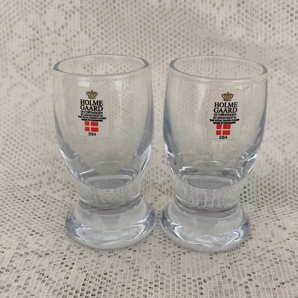 A pair of vintage Holmegaard 284 shot glasses made in Denmark.